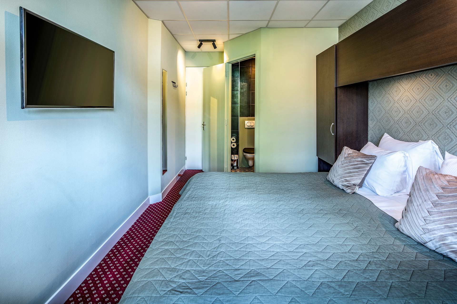 The room looking towards the bathroom