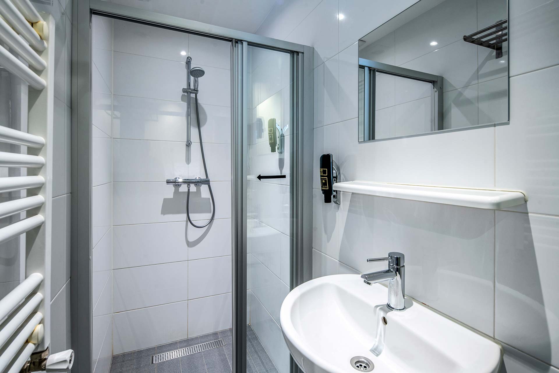 The private bathroom with a walk-in shower