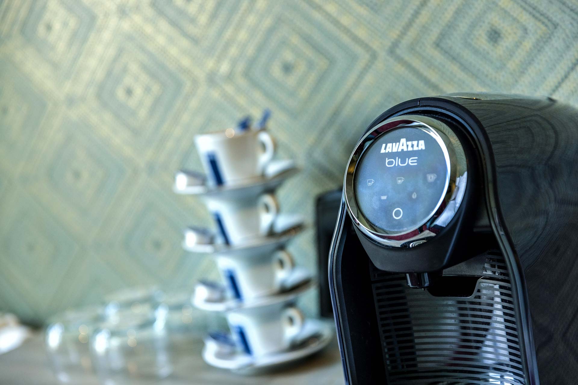 The in-room coffee machine and cups
